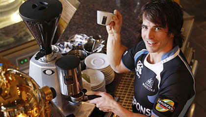 Colin Gregor, served his city in style this morning as he became a flamboyant Italian barista 