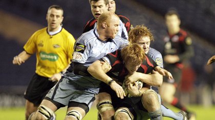 Martyn Williams makes a tackle