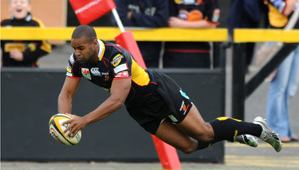 Aled Brew dives over for the Dragons' opening try