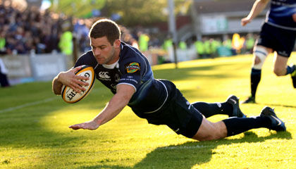 Fergus McFadden dives over to score Leinster's first try