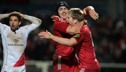 Niall Ronan congratulates Munster's try scorer Ivan Dineen