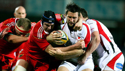 Ulster try scorer Simon Danielli is tackled by Munster's Billy Holland