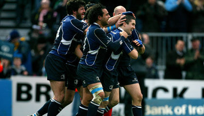Try scorer Simon Keogh is congratulated by his Leinster team-mates