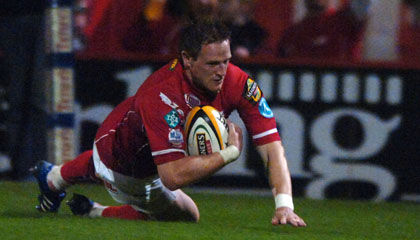 Scarlets winger Matthew Watkins touches down at Stradey Park