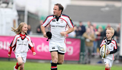 David Humphreys runs out at Ravenhill with his children Katie and James
