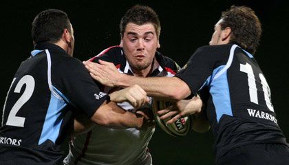 Ulster's Ryan Caldwell is stopped by the Glasgow defence