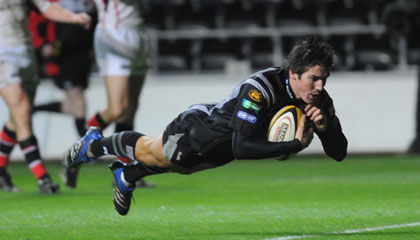 Ospreys fly-half James Hook dives over for his try against Ulster