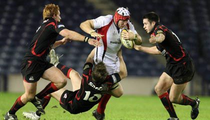 Ulster's Stephen Ferris is tackled by Roddy Grant, Phil Godman and John Houston