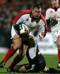 Paul James stops the charge of Justin Fitzpatrick