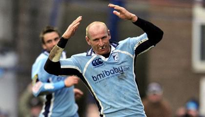 Cardiff's Gareth Thomas celebrates his try against Ulster