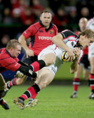 Andrew Trimble is stopped by Anthony Horgan